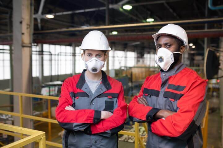 Workers in respiratory masks